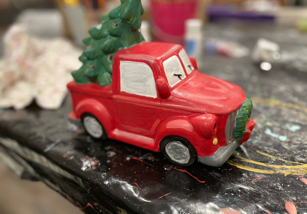 Truck with lighted Christmas Tree
